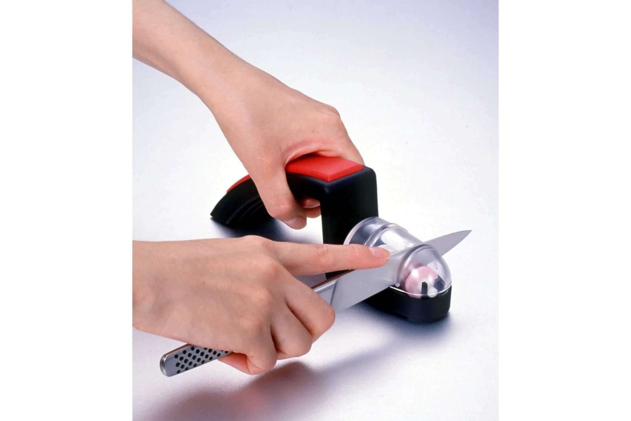 Global G-2 chef’s knife with knife sharpener